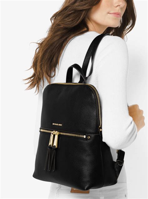 michael kors leather backpack.